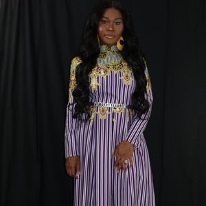 Purple womans dress with silver belt